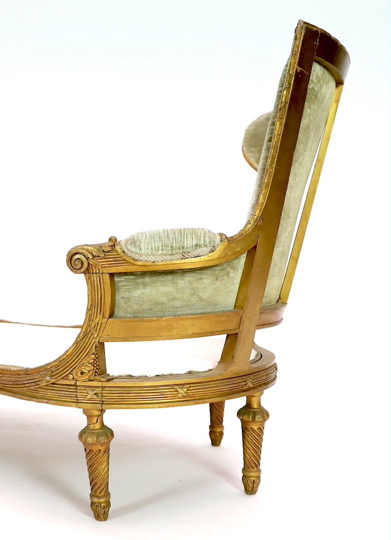 A 19th century Louis XVI style giltwood chaise longue, length 186cm depth 76cm height 95cm